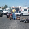 Chocan moto y Chevi frente al Sheraton